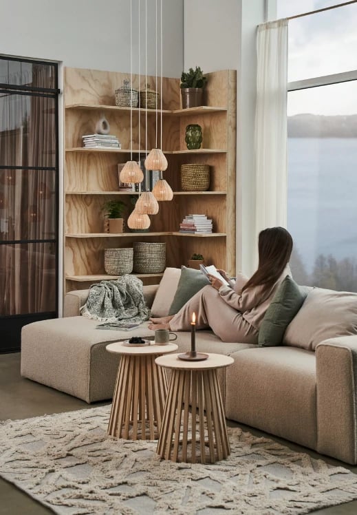 Woman chilling in cozy decor from Søstrene Grene